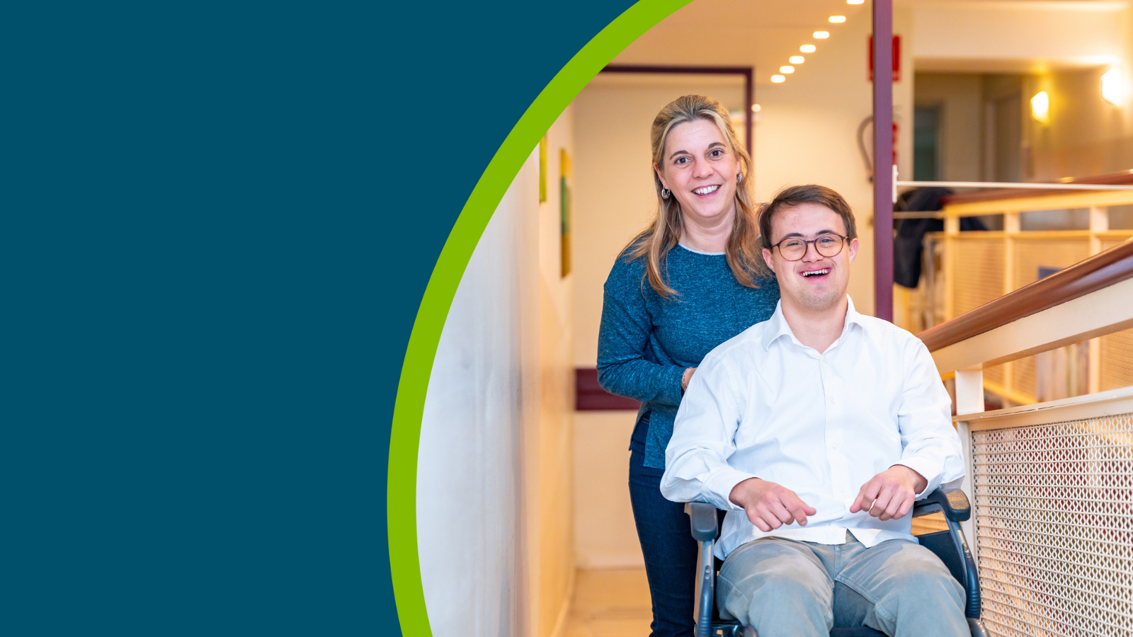 Happy portrait of a caregiver and man with down syndrome on wheelchair