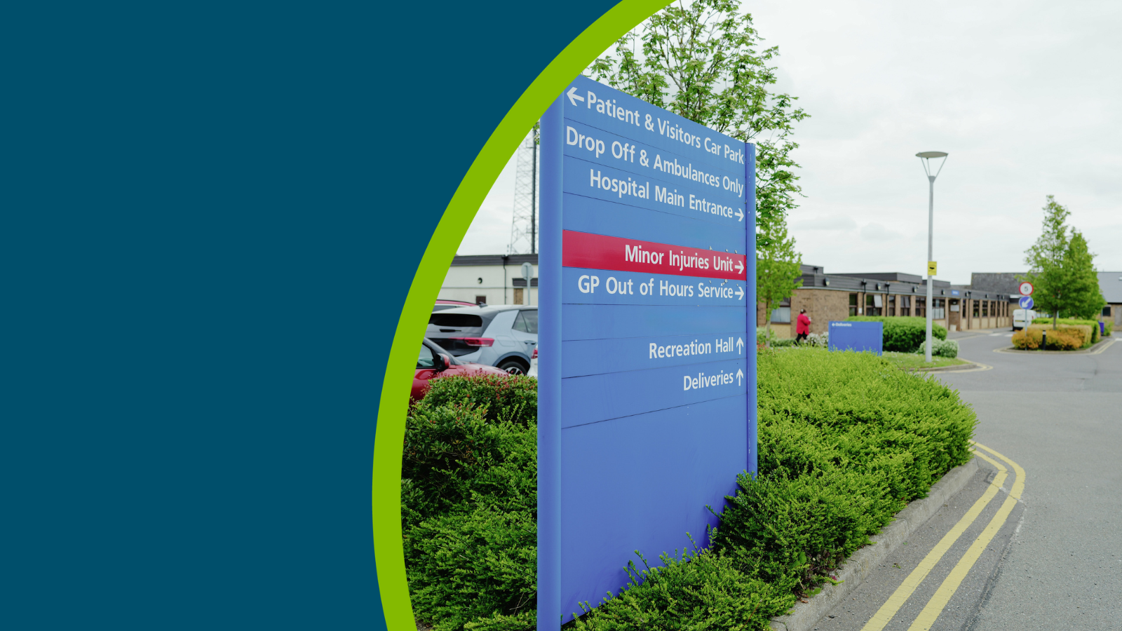 Hospital sign pointng toward patient and visitors car park, drop off, main hospital entrance, minor injuries unit, GP out of hours service