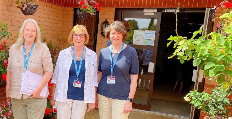 Volunteers at a visit to a care home.
