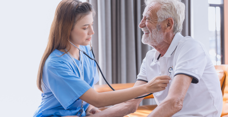 A doctor listening to a patient's heart.