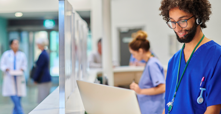 A healthcare professional at a hospital reception area