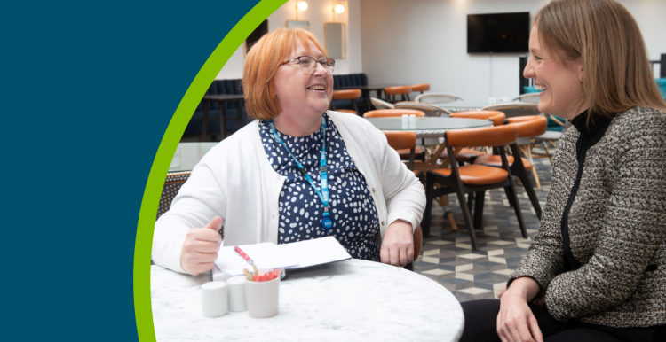 Jayne Richardson, a registered manager legacy mentor, sits at a table talking with Chantal Kinsella, who is the founder and manager at Bronte House Group, a bespoke homecare provider for older people, with a specialist focus on dementia care.