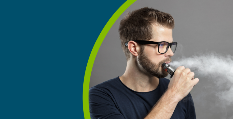 Man vaping with an e-cigarette