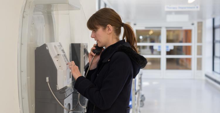 person using telephone in hospital