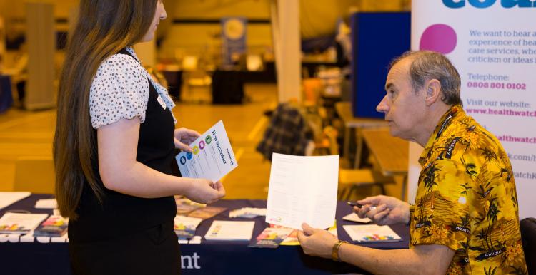 young woman and man at volunteer event