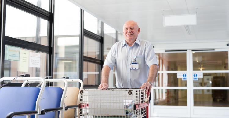 hospital worker stood in hospital