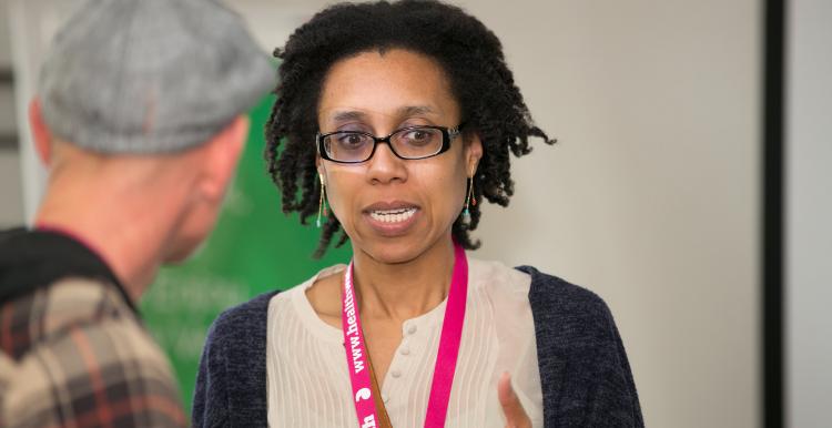 woman speaking at event