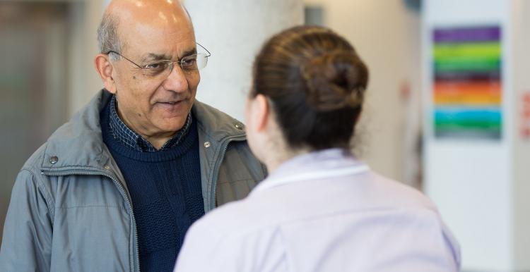 patient speaking to nurse