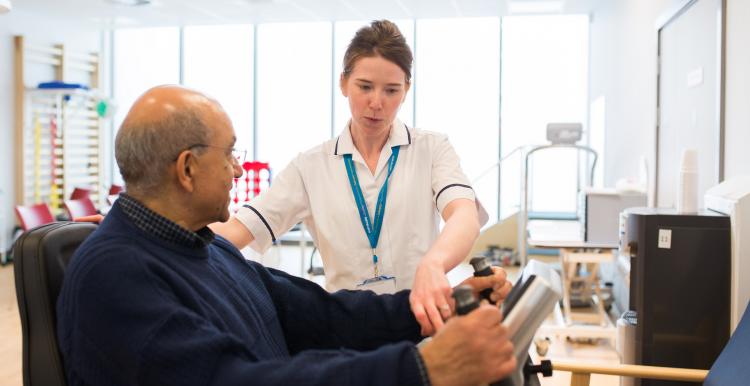 nurse with patient on mobility scooter