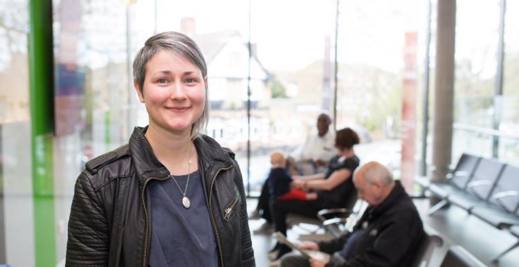 woman stood up in waiting room