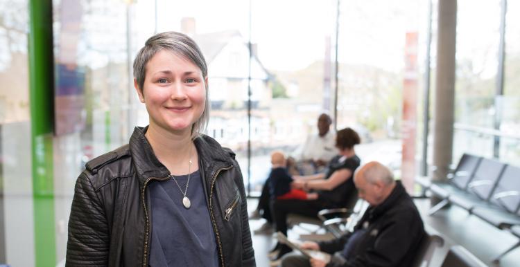 woman stood up in waiting room 