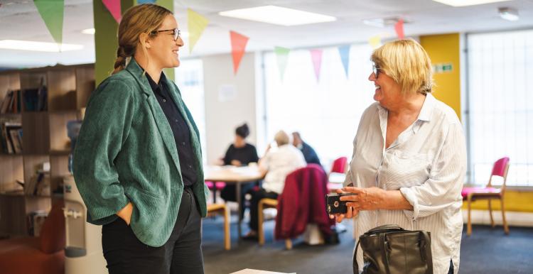 Two ladies having a conversation