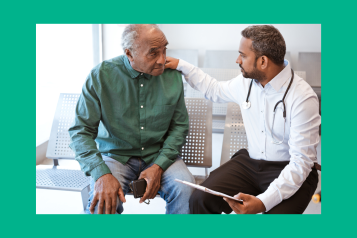A physician associate speaks with a patient in a hospital setting