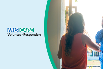 A healthcare professional visiting a lady at home. She is greeting him at the door with a handshake.