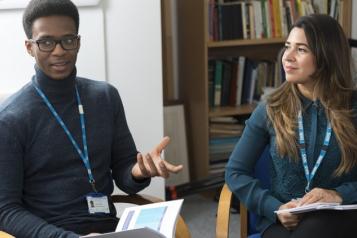 Mental health and well-being practitioners sat down and talking to each other