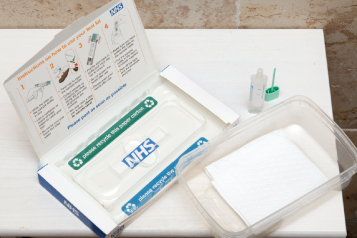 A bowel cancer test kit that is sent by the NHS.