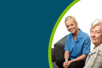 NHS healthcare professional sat with an older female patient