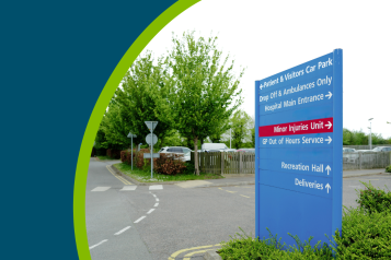 Typical NHS styled information sign seen adjacent to an outpatient car park in a British hospital.