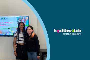 Joanna and Emily, work experience placements with Healthwatch, presenting what they have learned in front of a monitor in a meeting room.