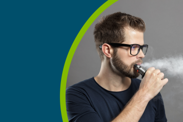 Man vaping with an e-cigarette