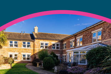 Outside of Leeming Bar Grange Care Home in North Allerton on a sunny day.