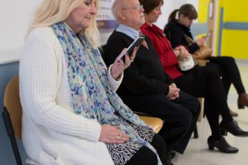 people sat in waiting room