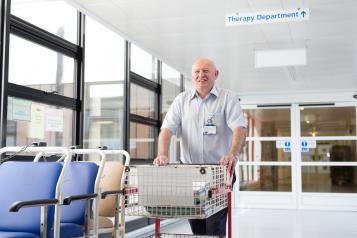 hospital worker stood in hospital