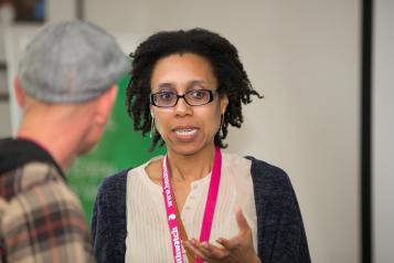 woman speaking at event