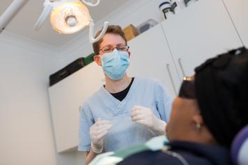 dentist examining patient