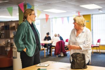 Two ladies having a conversation